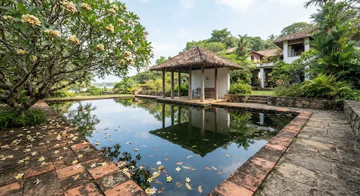 A pavilion beside a lotus pond