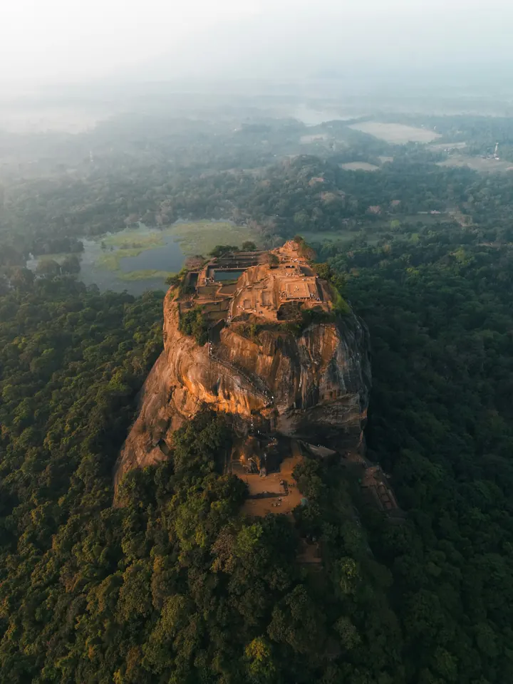 Aerial view of the Sigiriya rock fortress above the forest